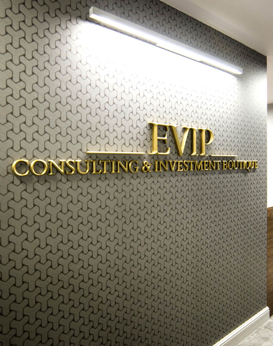 Evip - prismatic letters - Evip - 3D spatial prismatic letters placed in the lobby