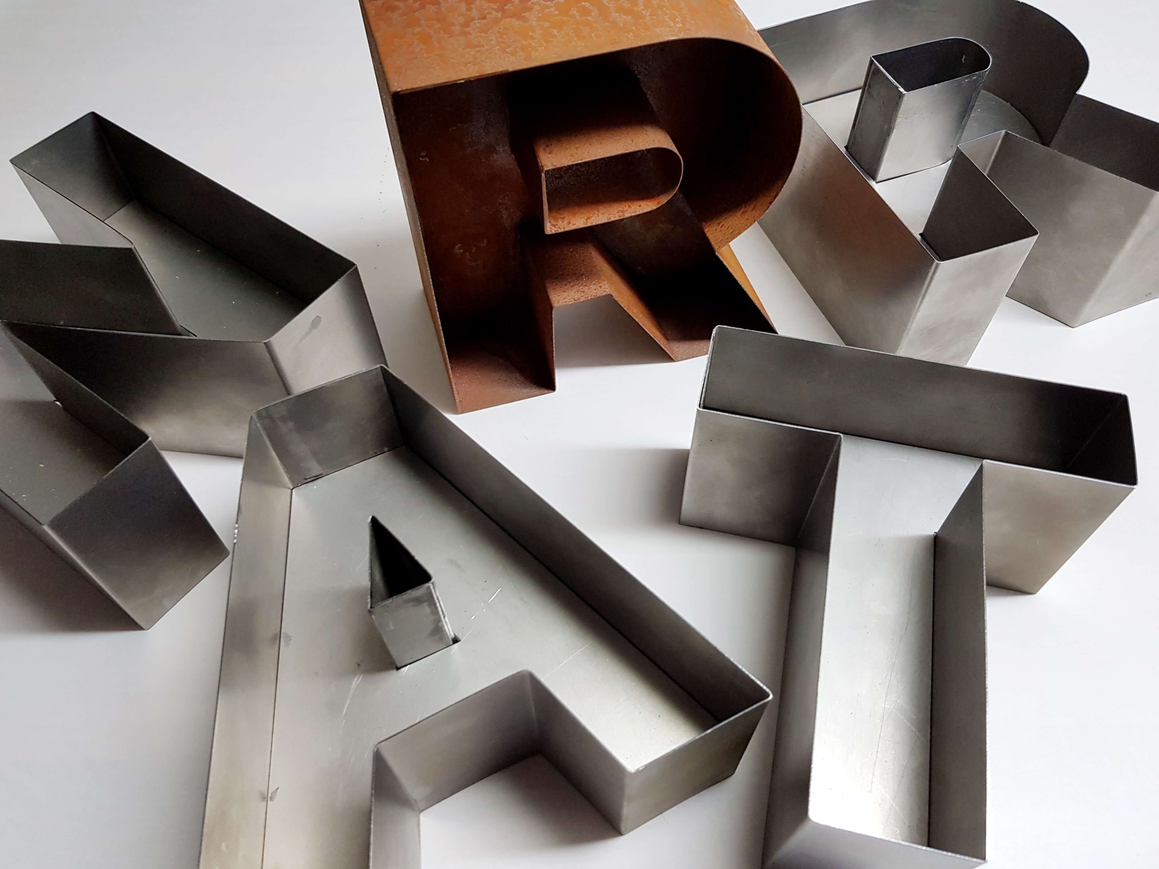 Rusty letters - Rusty sheet metal and metal letters