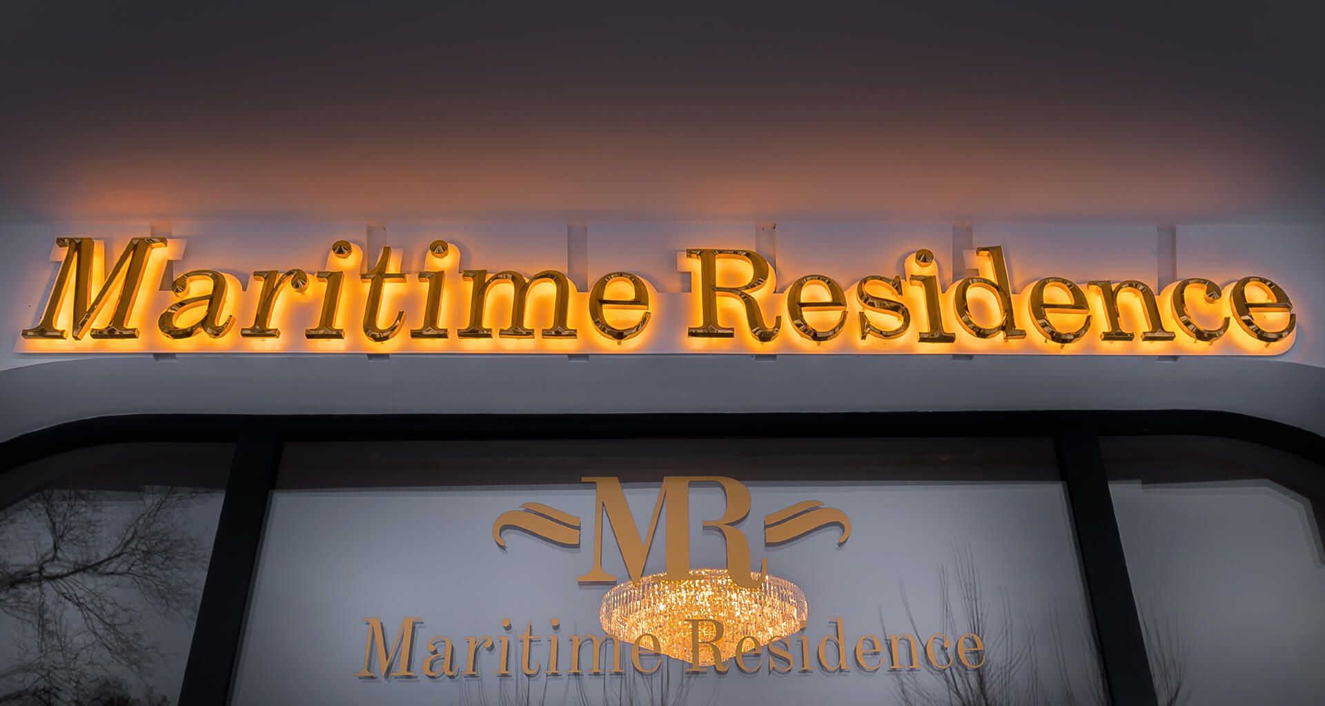 letters-above-entry - prismatic-letters-maritime-residence-gold-prismatic-prismatic-letters