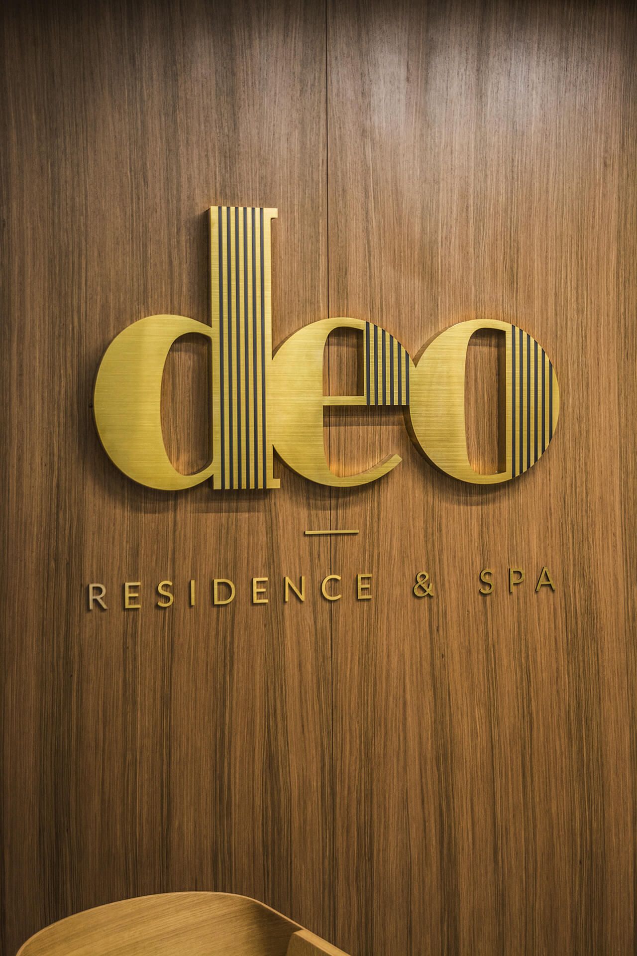 deo residence deo hotel spa - deo-residence-liters-from-solid-steel-brushed-lettering-over-the-entry-to-the-office-building-liters-at-height-mounted-to-the-wall-liters-on-sheets-liters-on-decks-logo-firm-gdansk